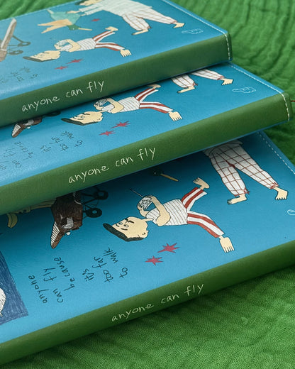 ‘Anyone can fly’ Cushion Cover Notebook